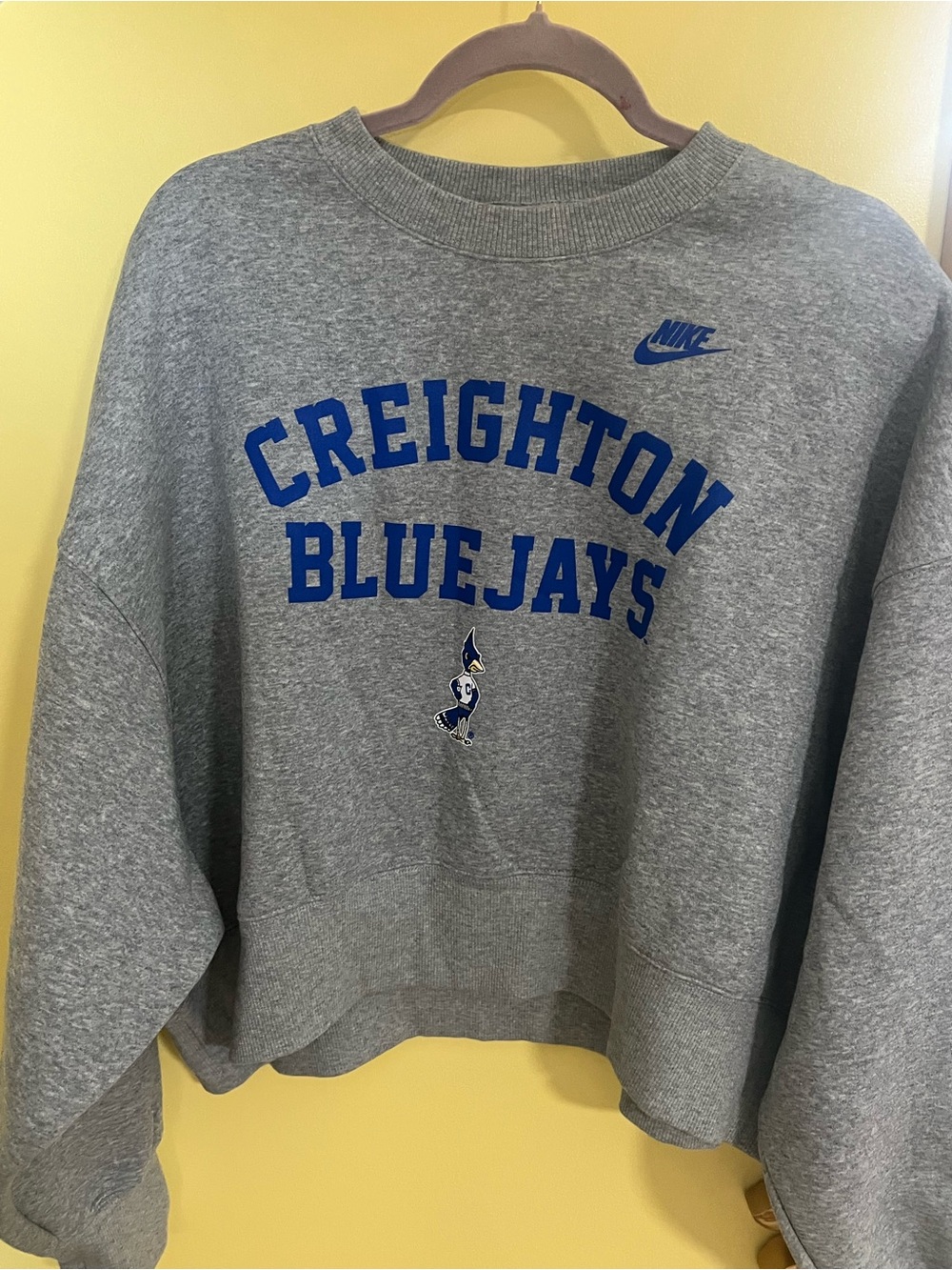 Creighton Nike Gray Crewneck Sweatshirt with Blue Creighton Bluejays Logo